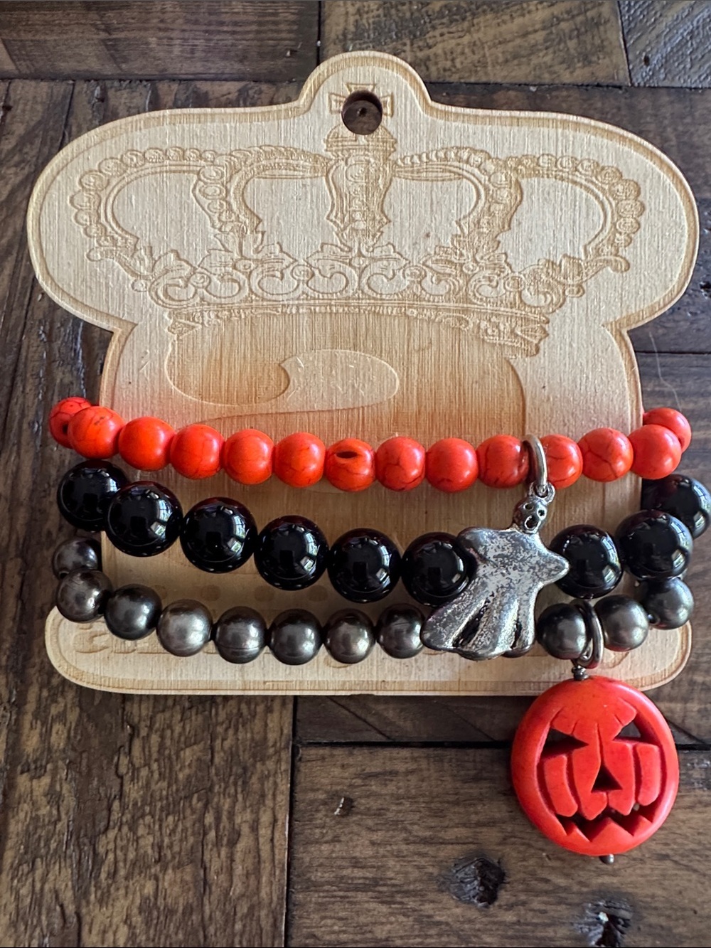 Art by Amy Hallowee Orange and Black Beaded Charm Bracelet Set.